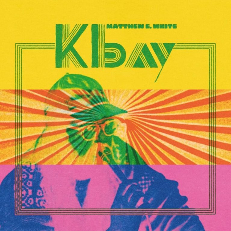 Grelles Pop-Art-Cover zu „K Bay“ von Matthew E. White mit psychedelischen Farben, Sonnenstrahlen und verfremdetem Porträt des Künstlers.