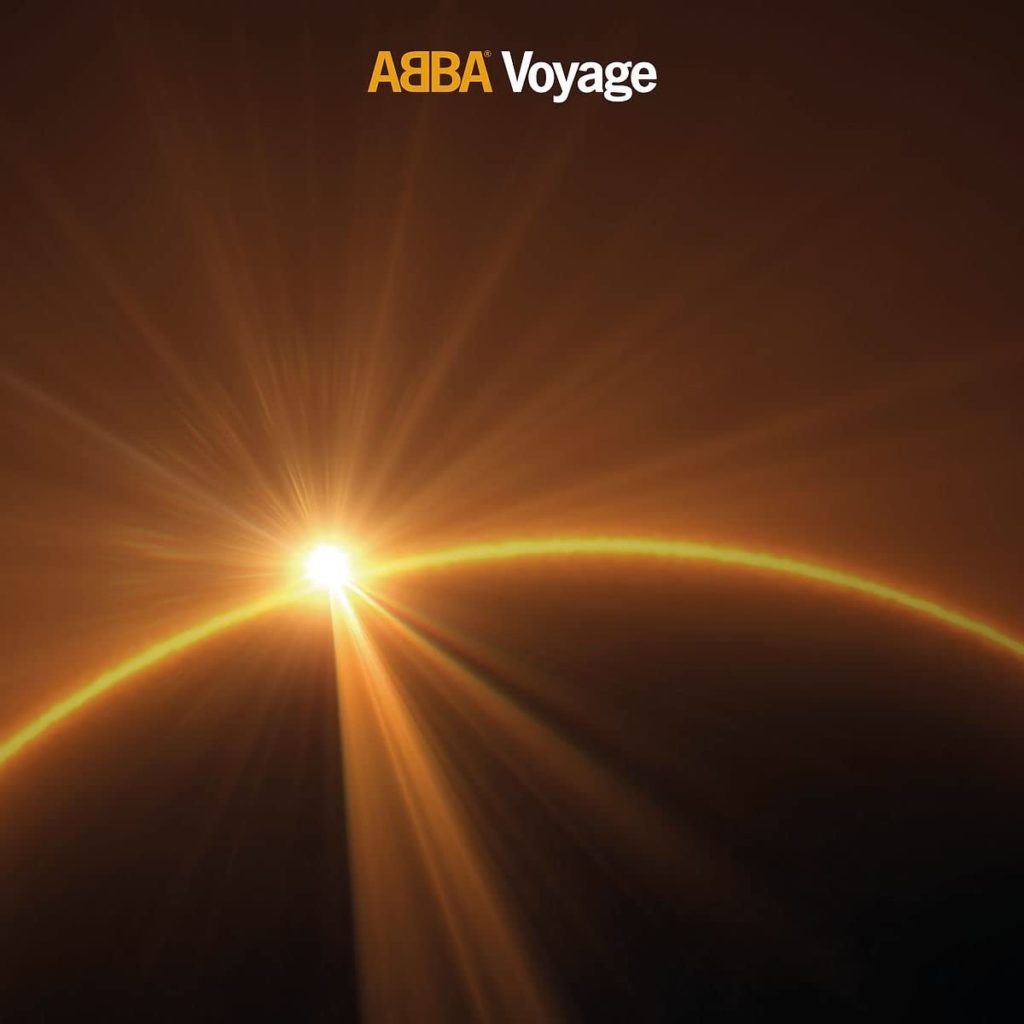 Ein gleißender Sonnenaufgang über dem dunklen Horizont im All – das Cover von ABBAs Voyage inszeniert ihre Rückkehr als kosmisches Spektakel.
