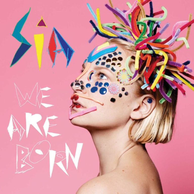 Coverbild des Albums We Are Born von Sia mit bunten Gesichtsmustern und einer auffälligen Frisur.