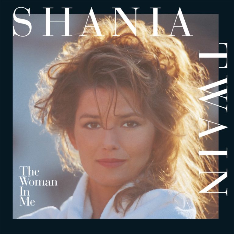 Porträt von Shania Twain mit lockigem Haar und ernstem Blick auf dem Albumcover.