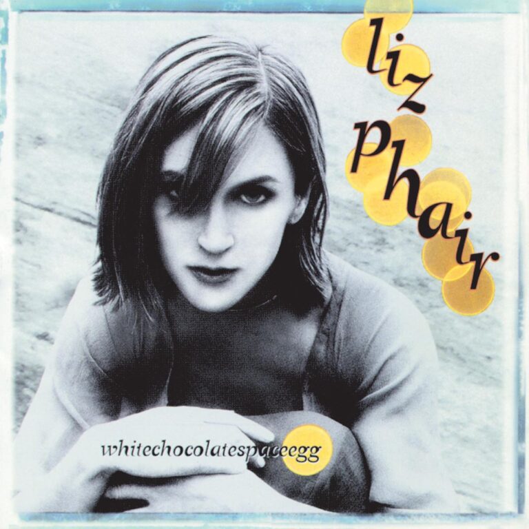 Frau mit schulterlangem Haar blickt ernst in die Kamera, gelbe Punkte und Schriftzug liz phair auf dem Cover.