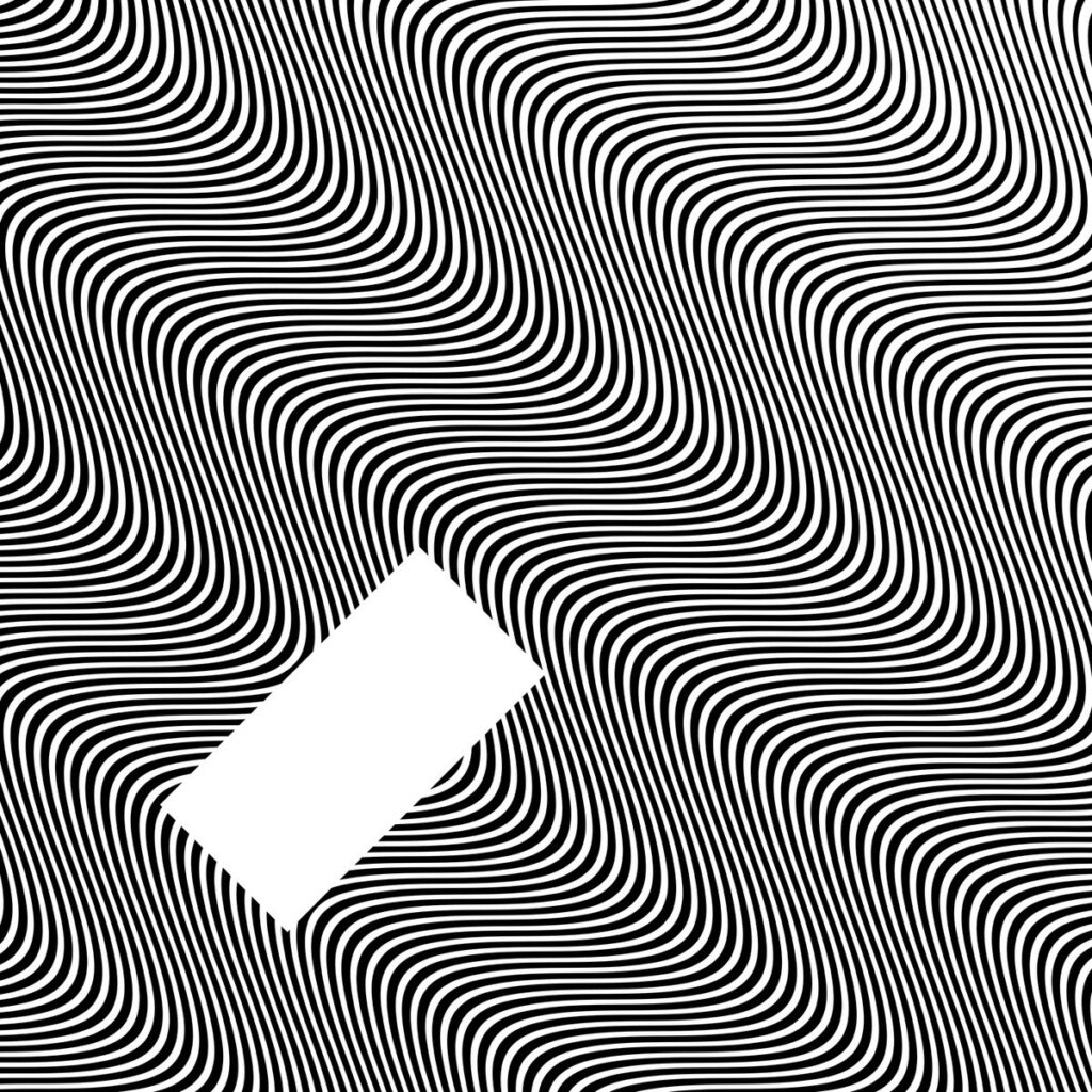 Albumcover zu "In Waves" von Jamie xx mit hypnotischem Schwarz-Weiß-Linienmuster und schräg platziertem weißen Rechteck im Zentrum.