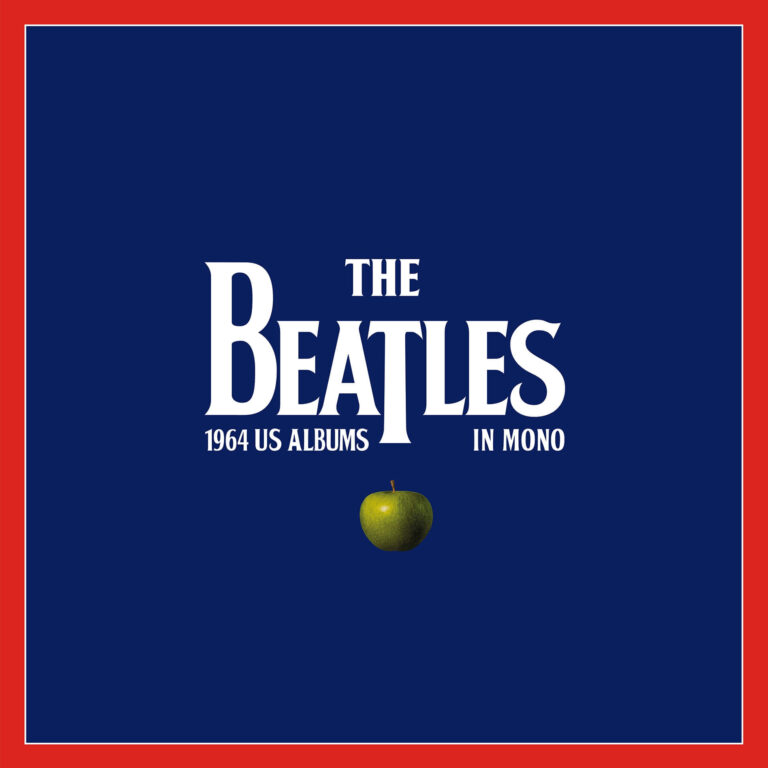 Dunkelblaues Cover mit rotem Rahmen, mittig „The Beatles – 1964 US Albums in Mono“ in Weiß, darunter ein grüner Apple – klassisches Boxset-Design.