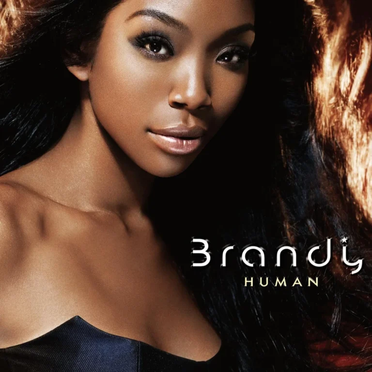 Nahaufnahme von Brandys Gesicht mit Albumtitel Human im Vordergrund.