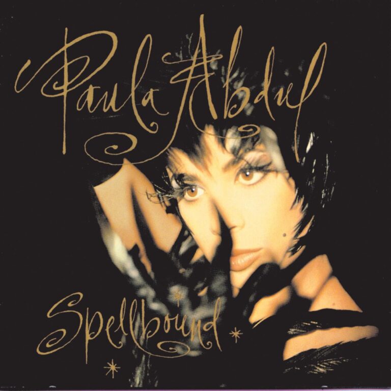Porträt von Paula Abdul mit geheimnisvollem Blick und Albumtitel Spellbound in geschwungener Schrift.