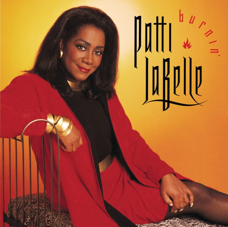 Patti LaBelle in rotem Outfit vor gelbem Hintergrund mit Albumtitel Burnin