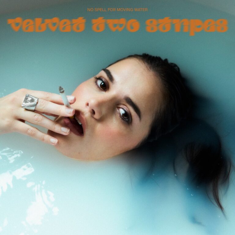 Albumcover zu „No Spell for Moving Water“ von Velvet Two Stripes – Frau liegt rauchend in milchig-blauem Wasser, mit intensivem Blick und Retro-Schriftzug.