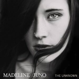 Cover des Albums „The Unknown“ von Madeline Juno – Schwarz-Weiß-Porträt der Künstlerin mit ernstem Blick und dunklem Haar, 2014 erschienen.