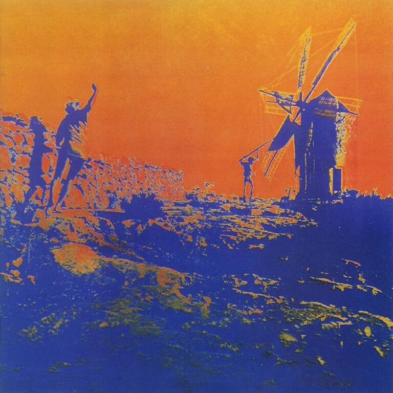 Psychedelisch verfärbtes Filmstill mit zwei Personen vor einer Windmühle auf Ibiza, in kräftigem Orange und tiefem Blau, genutzt als Covermotiv des Pink-Floyd-Soundtracks More von 1969.